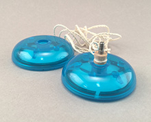 Unscrewed blue yo-yo showing wooden axle and string.